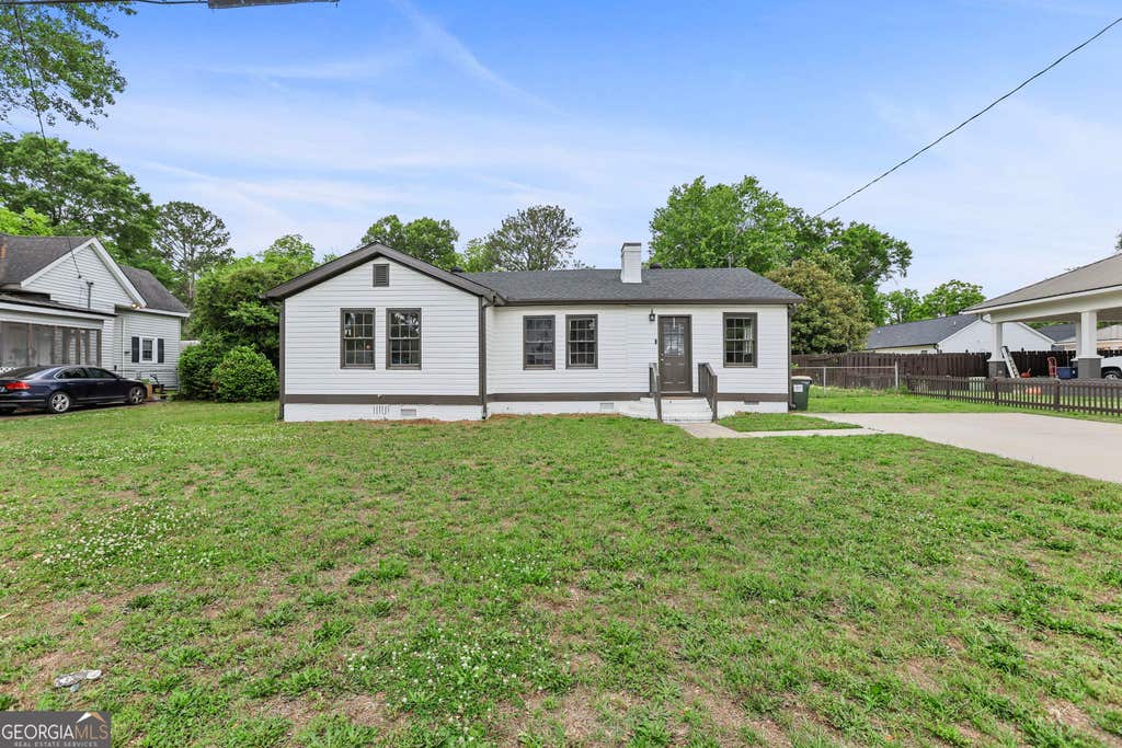 Photo of 311 Folk Avenue, Woodbury, GA 30293 (MLS # 10777754)