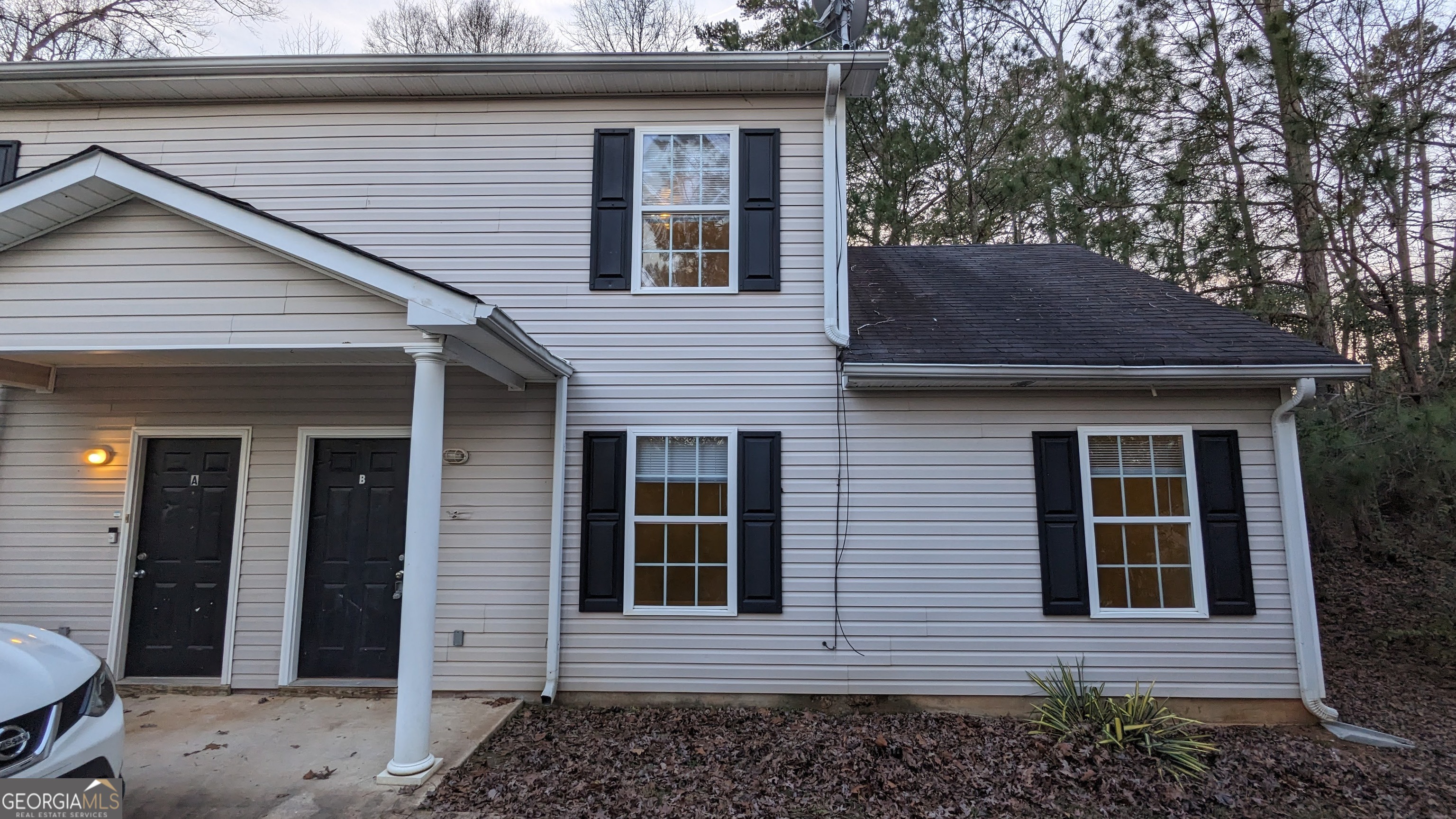Fully Remodeled 3/2.5 Duplex! New Paint, Laminate Floors, Stainless Steel Appliances, Toilets, Cabinets/Countertops, Shower etc. Master is on the Main! Half Bath for Guest! Covered Back Patio for grilling with Family and Friends! Great Location near Twin Lakes off the Back Roads. Although steep driveway, it sits in a private setting. Call today to preview! Water is included in rent. Reduced Rental Rate with 2+ year signed lease! Apply on apartments.com