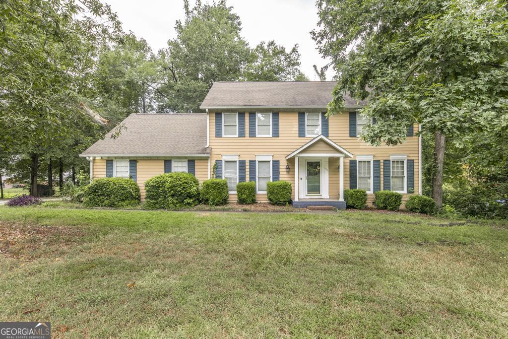 Looking for a home in desirable North Macon? This spacious gem has just hit the market and is ready to impress! With room for everyone, it features a living room, dining room, den, and a large kitchen-plus a private upstairs bedroom just off the kitchen. Head around to the other side of the house and go upstairs to find three additional generously sized bedrooms, including a massive master suite with three walk-in closets and a large, private bath with a separate vanity area. Enjoy outdoor living with a screened-in patio and a big backyard complete with a pool, all on over half an acre. This is the one you've been waiting for-don't miss it!