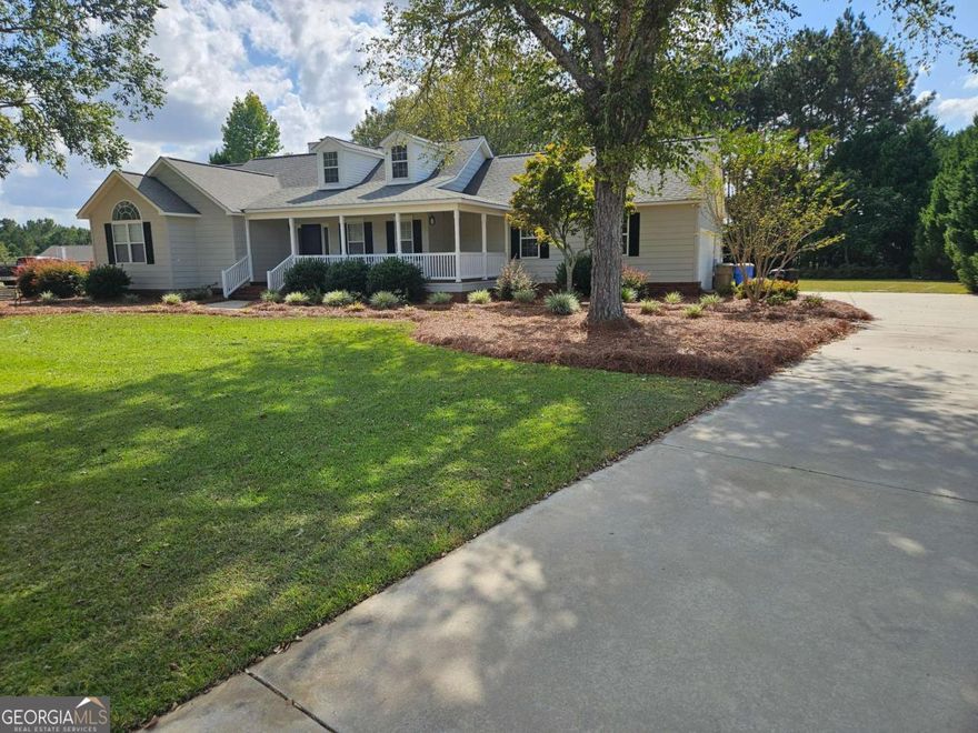Located less than 5 minutes from town, shopping centers, schools, and hospital!!  Words cannot adequately describe this BEAUTIFUL home in Pebble Hill Estates offering almost an ACRE  (0.94)  of PRIVACY trees and landscaping!  NEW paint, NEW Carpet in bedrooms, NEW ceiling fans, NEW floors in laundry room, NEW TILE shower in master bathroom, NEW screen porch, its almost all NEW!!!   Oversize 2 car garage with built in SHOP and roll up doors!  This immaculate dwelling offers great open floor plan, with Pergo floors, granite countertops, beautiful solid wood cabinetry along with large breakfast area and formal dining room!  Spacious Laundry room offers toilet closet, walk in pantry, and utility sink!  Huge master bedroom and a walk-in closet big enough for a small village!  Master bath includes a large garden tub and NEW WALK IN TILE SHOWER!   Take a look at photos and call for your tour today!