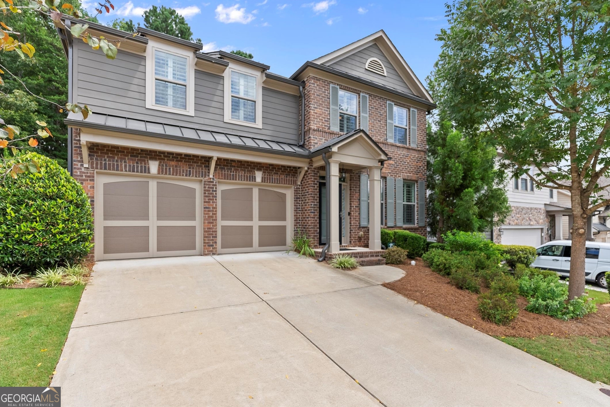 Welcome home to this beautifully updated 4-bedroom, 2.5-bath home in sought-after Stoney Creek! Ideally located just minutes from both vibrant Downtown Woodstock and the booming Downtown Holly Springs, this move-in ready gem offers the perfect blend of comfort, style, and convenience. The spacious main level features a serene primary hard wooded suite with a luxurious en-suite bath with quartz countertops and a custom closet system designed for optimal organization. You'll also find an elegant formal dining room and a gorgeous kitchen with cambira countertops, stainless steel appliances, hardwood floors, and a view to the vaulted fireside family room-perfect for entertaining or everyday living. Beautiful plantation shutters are throughout every window in this home creating elegance throughout. Upstairs, a large loft provides flexible space ideal for a media room, playroom, or home office. Jack and Jill bathroom with quartz countertops and tile floors. The secondary, upstairs bedrooms are large with walk in closets and ample natural light. Step outside to your private, fenced backyard complete with professional landscaping and patio with wooded pergola-perfect for relaxing or hosting guests. Every inch of this home has been thoughtfully updated for modern living. Located in a vibrant community with two pools, a playground, and an active HOA. Don't miss your chance to live in one of Woodstock's most desirable neighborhoods!