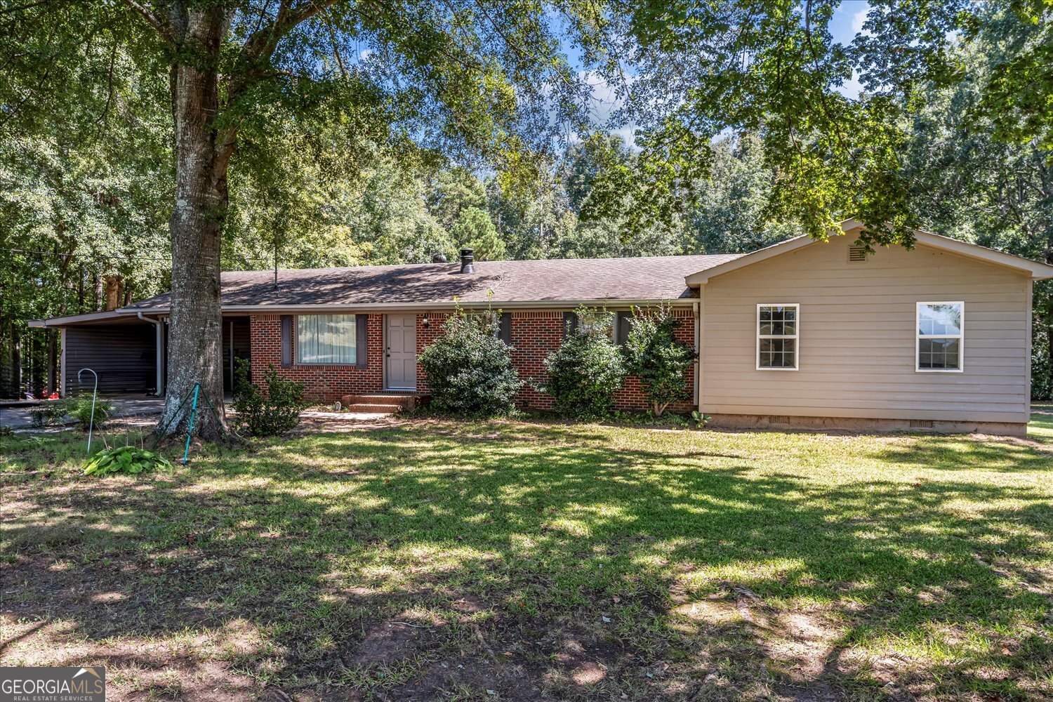Welcome to 3230 Eatonton Road in beautiful Madison, Georgia! This spacious 5-bedroom, 3-bath brick home sits on nearly an acre (.93 acres) and offers plenty of room both inside and out. With its classic brick exterior, generous floor plan, and versatile living spaces, this home is perfect for families or anyone looking for extra space. The large lot provides privacy, outdoor enjoyment, and room to grow-all while being conveniently located near Madison's shops, dining, and schools. With a little vision and personal touch, this property can truly shine as your dream home.