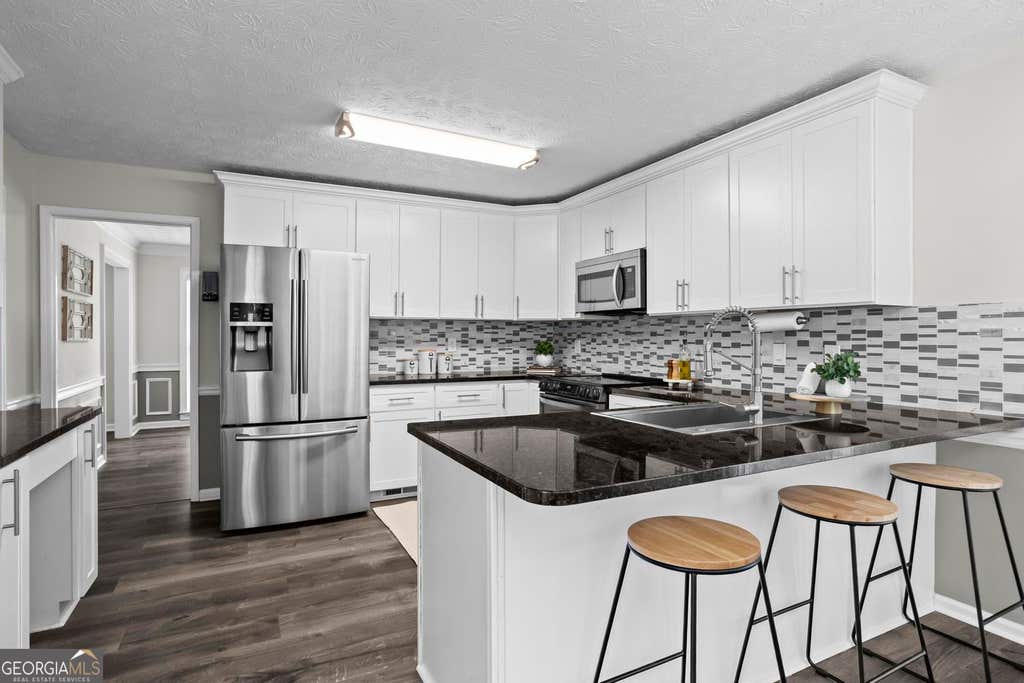 Photo of 2731 Wynford Avenue SW, Marietta, GA 30064 (MLS # 10830391)