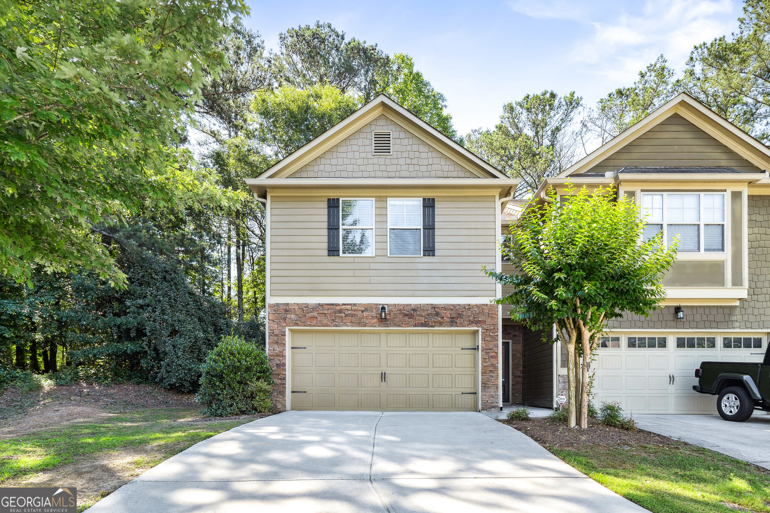 Welcome home to this beautifully updated 3-bedroom, 2.5-bath townhouse in Woodstock. With modern finishes, a low-maintenance design, and a prime location near Hobgood Park and Lake Allatoona, this home is the perfect fit for today's renter. The open-concept main level features a spacious living room that flows into the dining area and kitchen-ideal for entertaining or everyday living. Recent upgrades include new luxury vinyl plank flooring and freshly painted interiors, creating a bright, modern atmosphere throughout. Upstairs, the primary suite offers a relaxing retreat with a spa-inspired bathroom featuring double vanities, a soaking tub, and a walk-in shower. Two additional bedrooms share a full bath, giving you flexibility for family, roommates, or a home office. Step outside to enjoy your private back patio, perfect for grilling, lounging, or soaking up the sunshine. The home has been meticulously maintained, giving you peace of mind and comfort from the start. Located just minutes from shopping, dining, top-rated schools, Hobgood Park, and Lake Allatoona, you'll love the convenience and endless opportunities for recreation. Quick access to major roads makes commuting easy. This home is available for immediate move-in, and small pets are welcome! Washer and Dryer can be provided upon request at no additional charge.