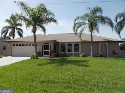 Photo of 1422 SE 15th Terrace, Cape Coral, FL 33990 (MLS # 10671882)