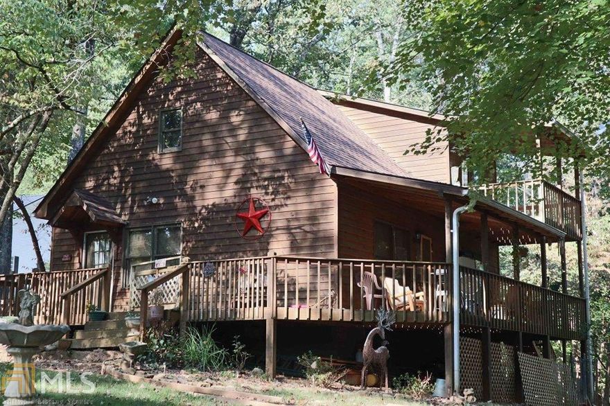 Enjoy resort living in this 2 BR/2 BA cabin with loft that would make a great home office or sleeping loft for extra guests. This home would make a nice vacation home or full-time residence. Lots of deck space & a gentle laying lot makes it ideal for gardening, pets & kids. Convenient location as it’s very close to the Main Gate! Just needs a little TLC but priced to sell! The resort offers access to the river for fishing, tubing, kayaking and you’ll love the other amenities such as clubhouse, fitness center, tennis & basketball courts, 3 swimming pools (one indoors), puttputt and parks.
