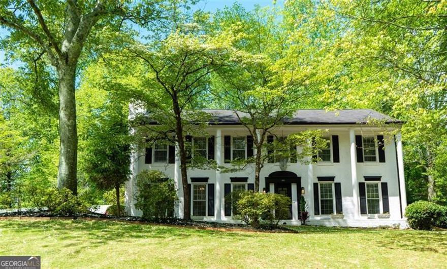 Price Reduced - Incredible Value! Colonial Elegance Meets Modern Comfort in East Cobb  Introducing a timeless Colonial-style masterpiece-beautifully updated to reflect today's modern tastes while preserving its classic charm. Nestled in the heart of East Cobb, this luxury 4-bedroom home offers the perfect blend of sophistication, warmth, and function.  From the moment you arrive, the home's symmetrical architecture, shuttered windows, and stately presence reflect the hallmarks of traditional Colonial design. Inside, you're welcomed by thoughtfully updated interiors-including a completely renovated owner's suite bathroom, spacious living areas, and a layout that balances open flow with defined spaces.  The oversized primary suite offers a serene escape, while the secondary bedrooms are impressively spacious-ideal for growing families or guests. The cozy fireside family room is perfect for movie nights, and the formal living room invites you to enjoy afternoon tea with friends or peaceful moments of relaxation.  The separate dining room, just steps from the kitchen, creates a seamless setting for both everyday meals and special occasions. A dedicated study/library offers the perfect space for remote work, homework, or quiet reading. The seller is open to reconverting the library space back into its original two-car garage for the highest offer.  The grand bonus room-a stunning addition to the home-is tailor-made for entertaining, from game nights to gatherings of every kind.  Step outside to a fenced backyard haven, perfect for pets and play, with plenty of space to entertain beneath the Georgia sky.  Located minutes from top-rated schools, premium shopping, dining, and social hubs, this home is not just a residence-it's a lifestyle.  Call today and schedule a tour!