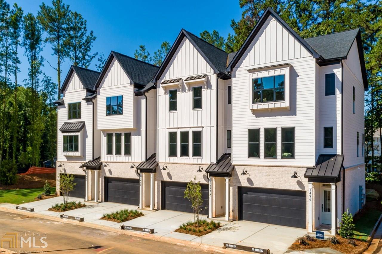 Beautiful new townhome located in desirable Decatur! Lindmoor Row is a new gated community of 33 townhomes located off of Lawrenceville Highway with easy access to I-285! The gorgeous designer finishes were hand-selected by interior designers to bring a fresh, modern farmhouse inspired feel. Smart appliances, quartz countertops, hardwood floors, custom lighting and designer tile come standard. Enjoy lots of green space, a large dog park and delightful restaurants, food trucks, farmers market, shops and parks close by. Model Open Now! Low HOA, local builder with over 20 years of experience, model hours Monday - Saturday 12 to 6pm, Sunday 1- 6pm.