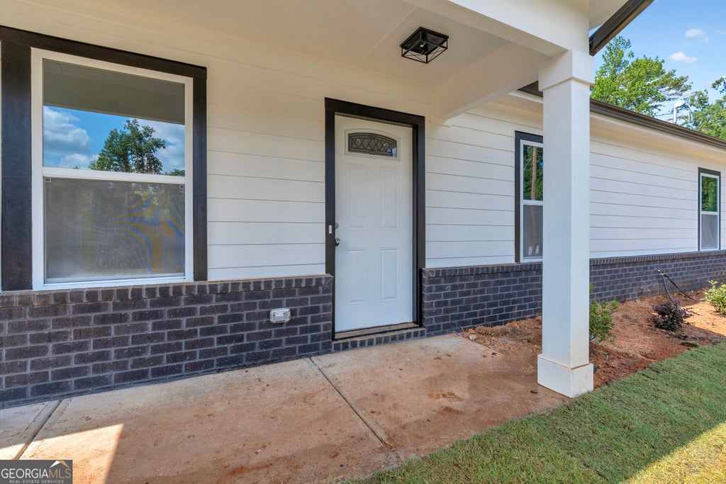 Photo of 1084 SW West Adrian Circle, Conyers, GA 30094 (MLS # 10808109)