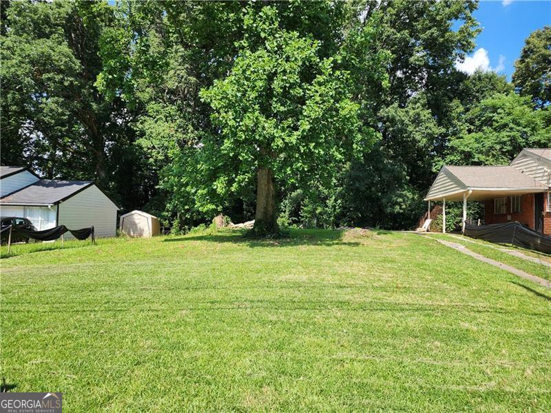 Great location and great price! North East Point land lot with potential for building a great home, 5 Minutes from Tyler Perry Studios and less than 15 minutes from Atlanta Hartsfield Jackson Airport, also less than 15 minutes to downtown Atlanta GA. full survey coming soon