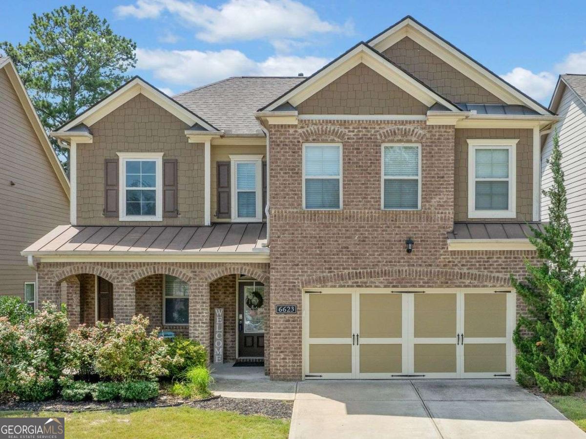 Welcome to 6223 Rivergreen Road, a stunning home located in Sterling on the Lake. The seller is offering $5,000 towards closing costs & golf cart. The primary suite on the main level is a retreat, offering an extended sitting area with patio access, a walk-in closet, and a luxurious en-suite with a soaking tub, separate shower, and double vanity. The kitchen is a chef's dream with stainless steel appliances, granite countertops, white cabinets, a tiled backsplash and a gas stove. All under high ceilings. The open-concept main floor features bamboo floors, recessed lighting, a spacious great room with a stacked stone fireplace, and dining area. The second level provides a versatile loft entertainment area, three additional bedrooms, and a shared bathroom with a double sink vanity. Step outside to enjoy the extended covered patio, a concrete walkway and a firepit platform, and a fully fenced backyard. With a two-car garage and main-floor laundry for added convenience, this home is ready to welcome you to a life of comfort and elegance. Sterling on the Lake is a premier swim and tennis community renowned for its resort-style living. From its scenic trails and sparkling lake, clubhouse, 6 pickleball courts, 4 pools, 4 tennis courts, and vibrant social events, this neighborhood offers a lifestyle that feels like a permanent gateway.