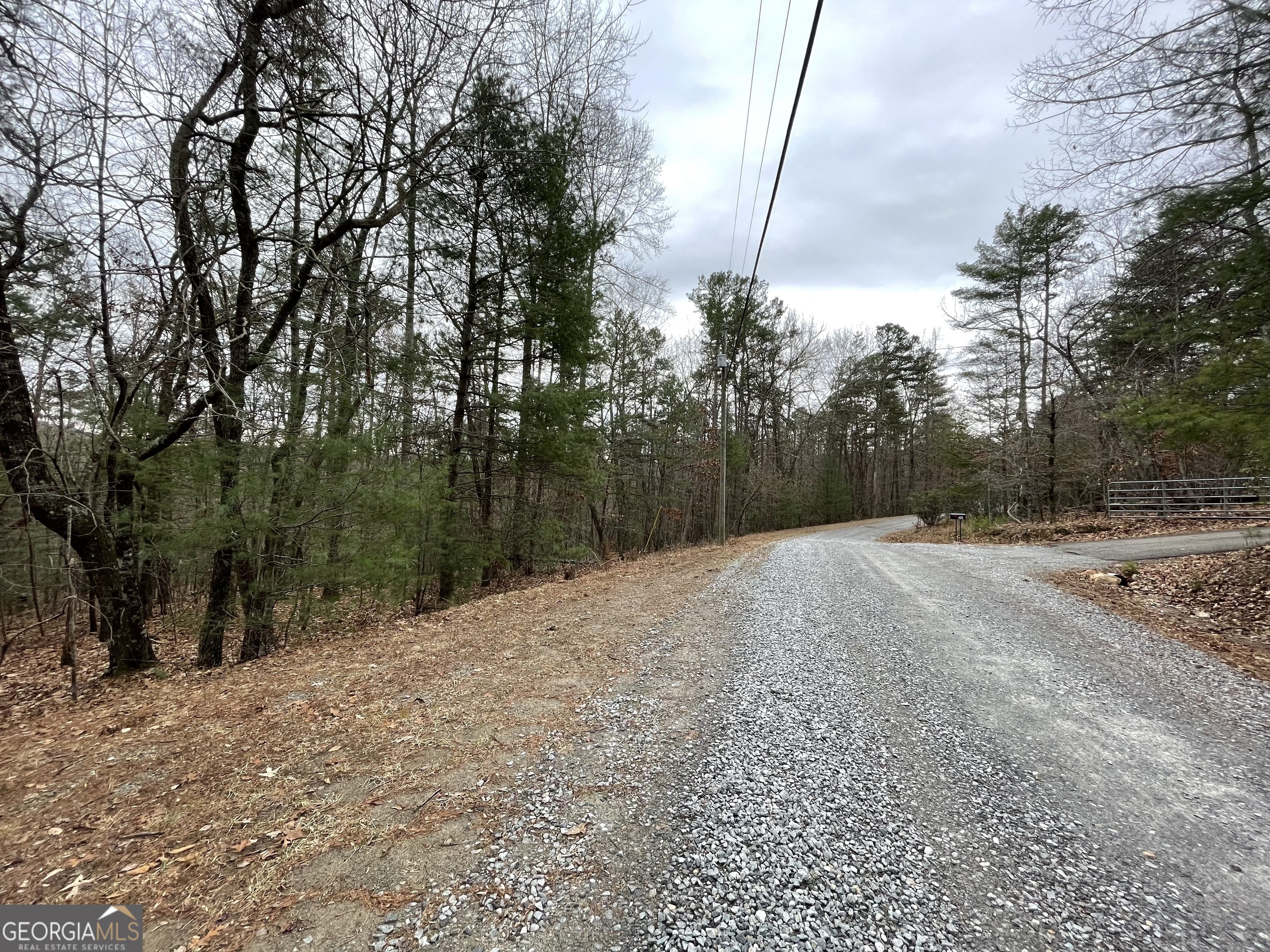 Come enjoy this gentle sloping 1.77 acre lot which has a soil test already done! Septic permit in the process of being completed by the owner. This well maintained gravel road has electric close by making it easy to build. Even with its private setting you are only 25 minutes from shopping and dining, and within 20 minutes to a number of wineries. Enjoy a picnic in the common areas while also fishing in Stover Creek. Come see the property for yourself and the clean and friendly neighborhood today!