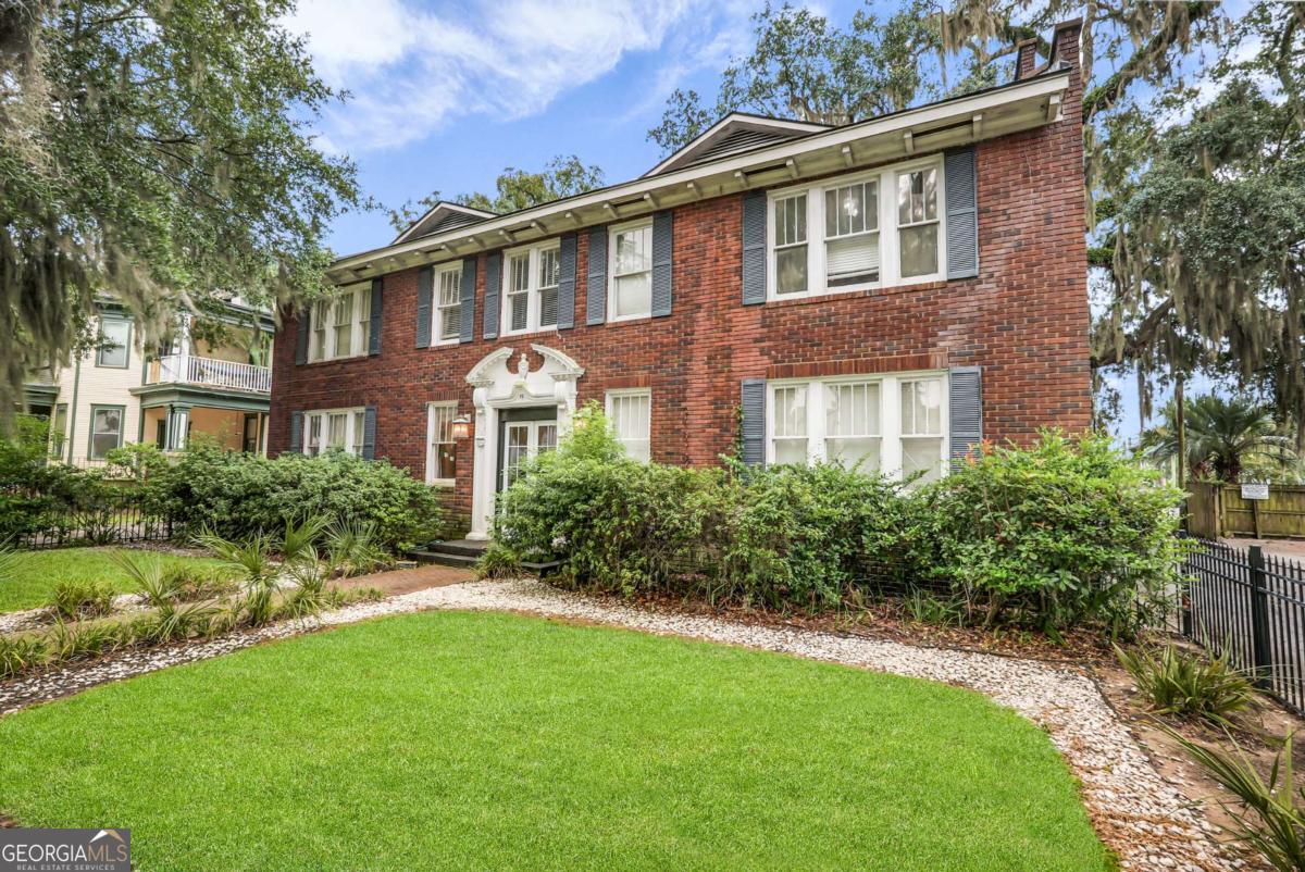 Unbelievable Opportunity To Live Downtown In A Stately Brick Condominium With Fenced Front Garden! This Second Story Updated Unit Features An Entry Foyer With Intercom System & Storage, Large Great Room With Lots Of Natural Light & Ceiling Fan, Big Bedroom With Ceiling Fan, Stylish Bath Room With Shiplap, Tile Floors & Surround and Window, Spacious Fully Equipped Eat In Kitchen Featuring Wood Floors, Granite Tops, Newer Cabinets, Deep Sink, Stainless Appliances, 5 Burner Gas Stove & Oven, An Office Area & A Stackable Washer & Dryer Closet. High Ceilings, Crown Molding, and Blinds Throughout!! Smart Thermostat and Tankless Water Heater. Fenced Storage Area In Basement. One Reserved Parking Space In The Private Fenced Parking Lot. Walk Or Bike Everywhere!