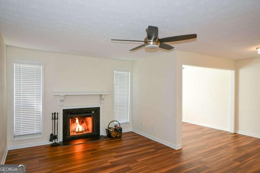 Welcome home to this beautifully completely renovated 1-bedroom, 1-bath condo offering 924 square feet of stylish, open-concept living. Every detail of this home has been thoughtfully updated to blend modern design with everyday comfort. Step inside to find brand-new flooring, new paint, new light fixtures, new appliances, new hvac, new water heater, and a spacious living area perfect for relaxing or entertaining. The kitchen features sleek quartz countertops, newly painted cabinetry and stainless steel appliances. The stackable washer and dryer is off the kitchen. You have a dining room alongside a sunroom encased with tons of natural lighting that can be conformed into a study, yoga room or secondary bedroom space.