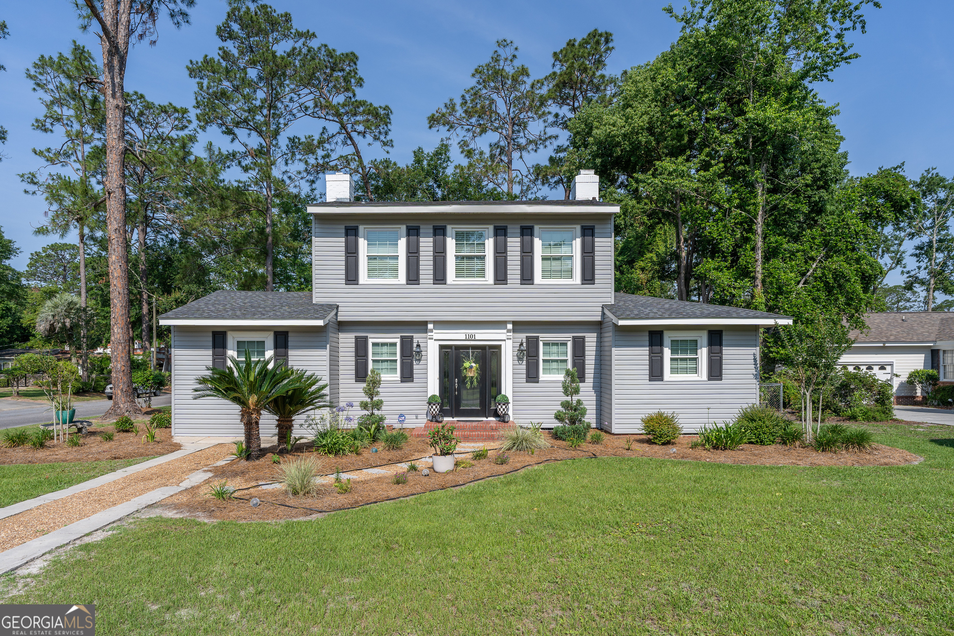 This stunning 3-bedroom, 2-bath home is fully updated and located in the highly sought-after Cherokee Heights! Enjoy peace of mind with a brand new architectural shingle roof, fresh vinyl siding, new downstairs AC, updated windows and doors (including a new front door and two new balcony doors), a brand new backyard deck, updated landscaping, and all-new appliances. Step inside to a spacious family room featuring a cozy fireplace, a charming wooden staircase, and a wide arched entryway leading to the formal dining area. Natural light floods the home through a wall of windows and a glassed-in sunroom, perfect for relaxing or entertaining. The main level includes a versatile bonus room with laundry-ideal for a home office, playroom, or potential 4th bedroom. One of the bedrooms is also conveniently located on the main floor, offering a great option for a primary suite. Upstairs, you'll find two additional bedrooms connected by a lovely balcony overlooking the fenced-in backyard. This home offers space, style, and flexibility in one of the area's most desirable neighborhoods. Don't miss your chance-schedule your showing today!