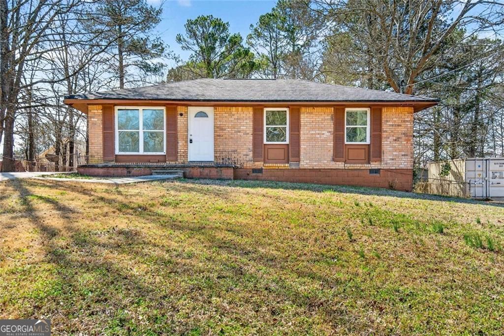 Photo of 8399 Attleboro Drive, Jonesboro, GA 30238 (MLS # 10697165)