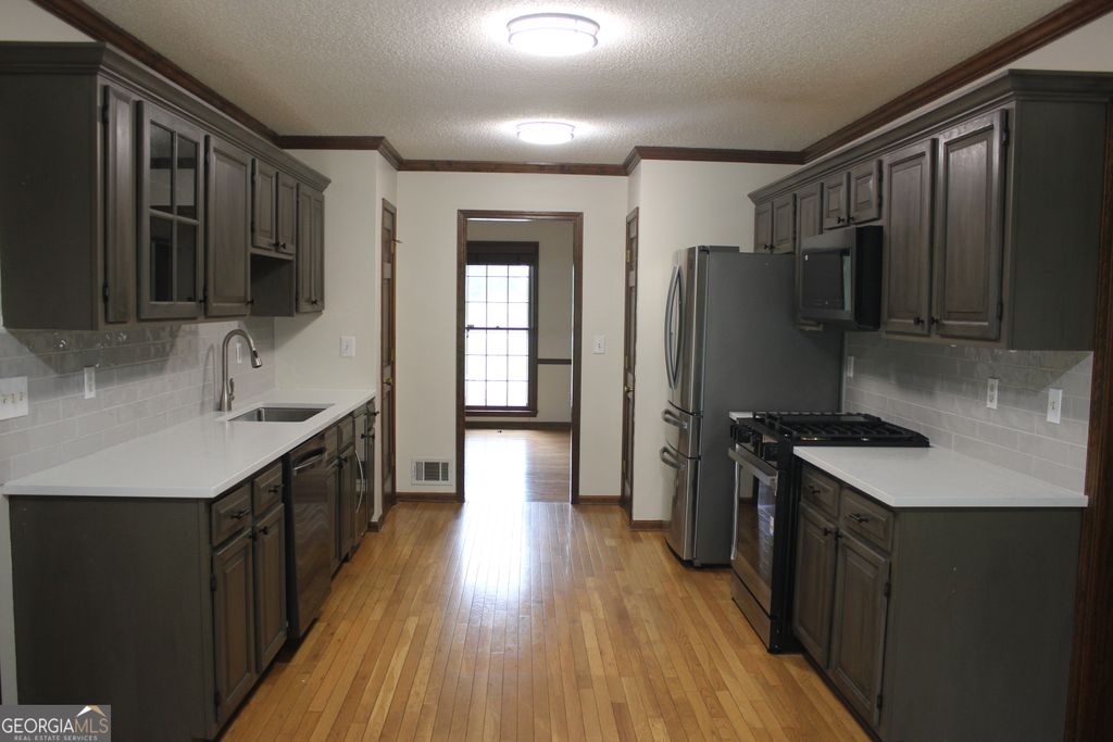 Photo of 230 Mapledale Trail, Sharpsburg, GA 30277 (MLS # 10755933)