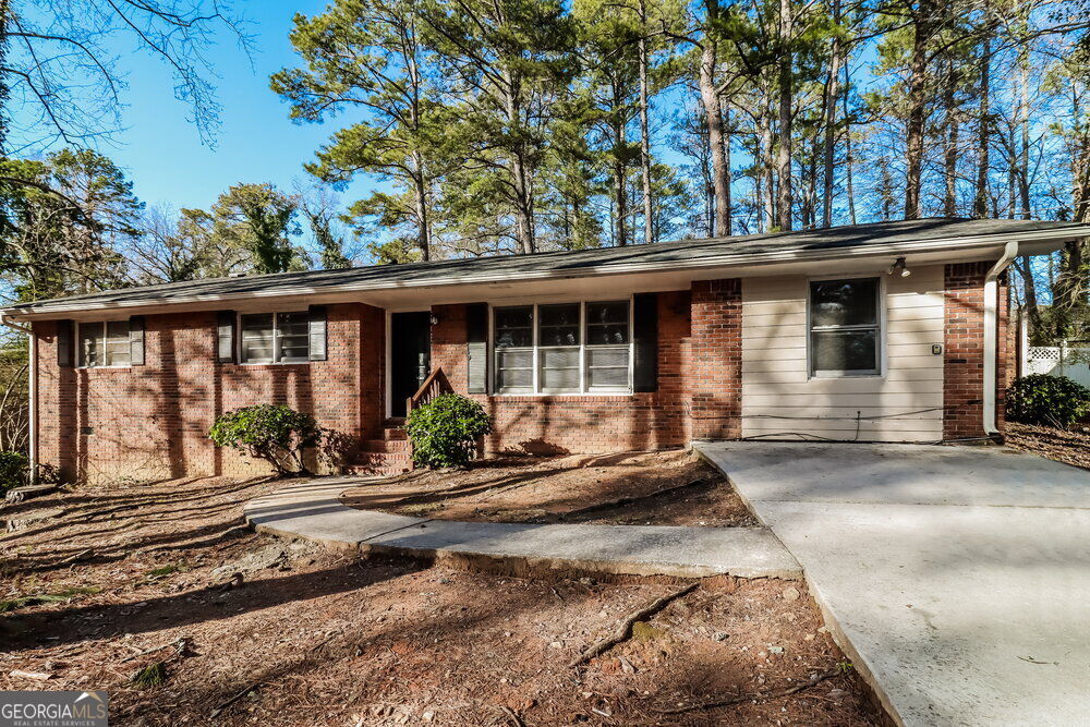 Photo of 3415 Lee Place, Atlanta, GA 30349 (MLS # 10872454)
