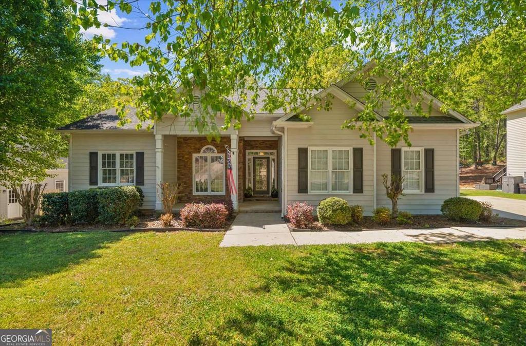 Photo of 720 Walnut Lane, Woodstock, GA 30188 (MLS # 10730387)