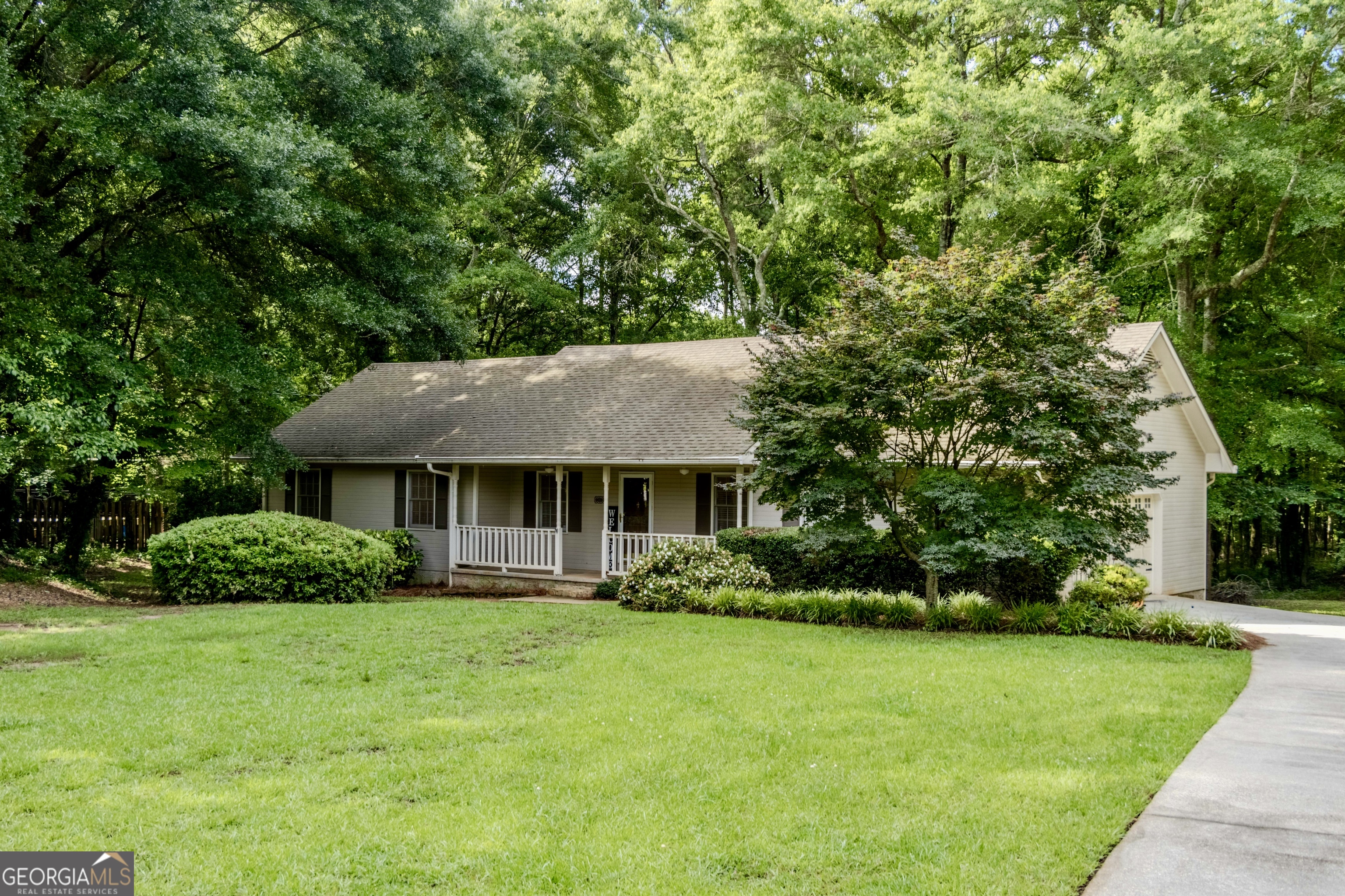 Charming Ranch Home on 1.25+/- Acres with Detached Workshop! Welcome home to this beautiful 3-bedroom, 2-bath ranch nestled on 1.25 acres. Featuring fresh paint and brand-new flooring, this move-in-ready home is waiting for you! Step inside to a large family room perfect for relaxing or entertaining, a separate dining room ideal for gatherings, and a spacious kitchen with a cozy breakfast area. Enjoy your morning coffee on the back deck overlooking the peaceful, private backyard. The property also includes a 16x24 detached workshop with power-perfect for hobbies or storage. This home is located in a convenient location near schools and easy access to I-75 or 19/41.