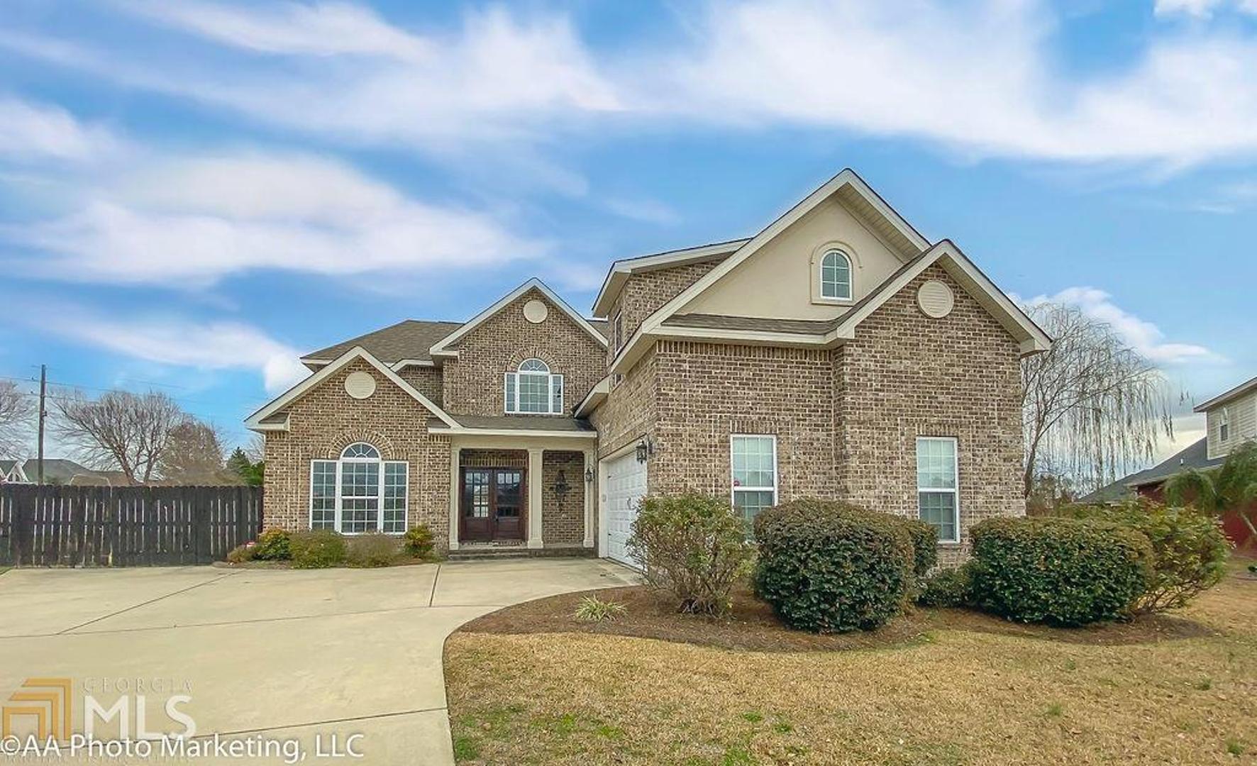 All brick home located in desirable Veteran's High district! Open the double front doors to gleaming engineered hardwood floors, open conceptliving, kitchen, and breakfast nook. Right outside your breakfast nook, overlook your backyard with privacy fence and covered porch, completewith swing. Downstairs, you will also find a large formal dining room, master bedroom with coffered ceilings and relaxing master bath, half bath,and large laundry room. Upstairs, you'll find 4 more bedrooms and full bath!