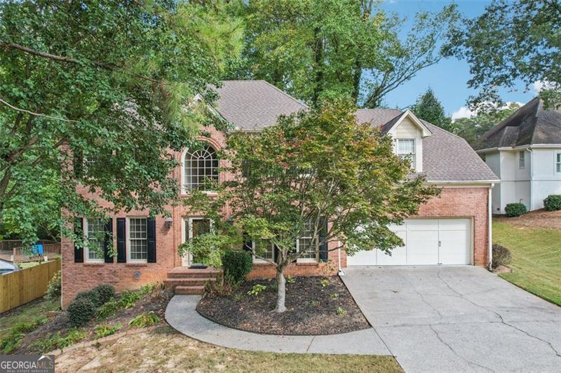 Welcome to your dream home in the heart of beautiful East Cobb! This stunning residence perfectly blends timeless elegance with modern comfort, offering a lifestyle that's both sophisticated and fun. Three-sided brick and private lot with plenty The upper-level features 4 spacious bedrooms and 3 full baths, designed with relaxation and convenience in mind. The primary suite is a true retreat-think spa vibes with room to unwind after a long day. On the main level, you'll fall in love with the chef's kitchen-ideal for hosting, meal-prepping, or late-night snack runs. A separate dining room brings everyone together, while the expansive family room (complete with fireplace + custom built-ins) delivers cozy nights and IG-worthy aesthetics. Don't miss the two-car garage and the private-screened-in porch, your perfect year-round chill spot. The full finished basement is an entertainer's dream, flowing out to a covered porch, a huge deck, and a sparkling pool, all overlooking your private backyard oasis. Whether it's summer pool parties, quiet coffee mornings, or weekend BBQs, this home is all about creating unforgettable moments. East Cobb living means top-tier schools, amazing community vibes, and easy access to dining, shopping, and outdoor adventures. This isn't just a house-it's a whole lifestyle upgrade.