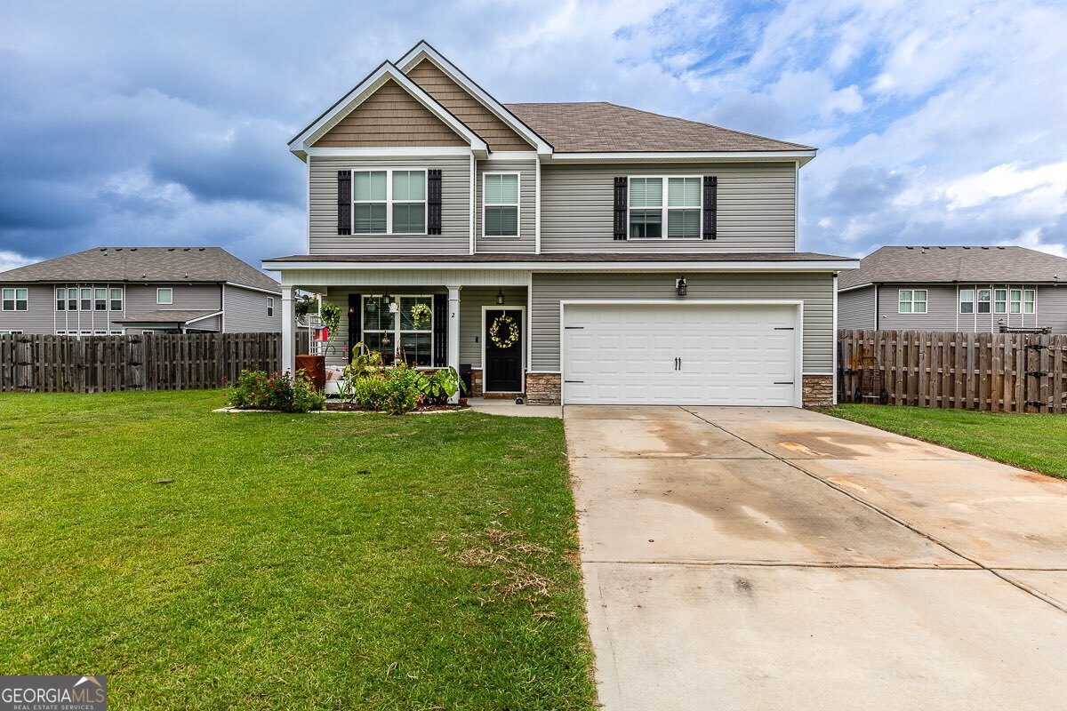 Tucked away in a quiet cul-de-sac in the desirable Mossy Hollow subdivision off Old Louisville Road in North Effingham, this spacious 4-bedroom, 2.5-bath home offers both comfort and convenience. The main level features stainless steel appliances, granite countertops, and durable hardwood laminate flooring throughout. A custom-built entertainment center enhances the inviting living space, while the formal dining room offers flexibility as a home office if needed. Upstairs, you'll find all four bedrooms, including a spacious primary suite with a double vanity, Jacuzzi tub, standalone shower, and walk-in closet. The secondary bathroom also includes a double vanity-perfect for family living. Enjoy the privacy of a large backyard, ideal for gatherings or outdoor play, and take advantage of the 2-car garage for added storage. Experience cul-de-sac living at its finest in Mossy Hollow-peaceful, private, and just minutes from Pooler, Savannah, and everything Effingham County has to offer.