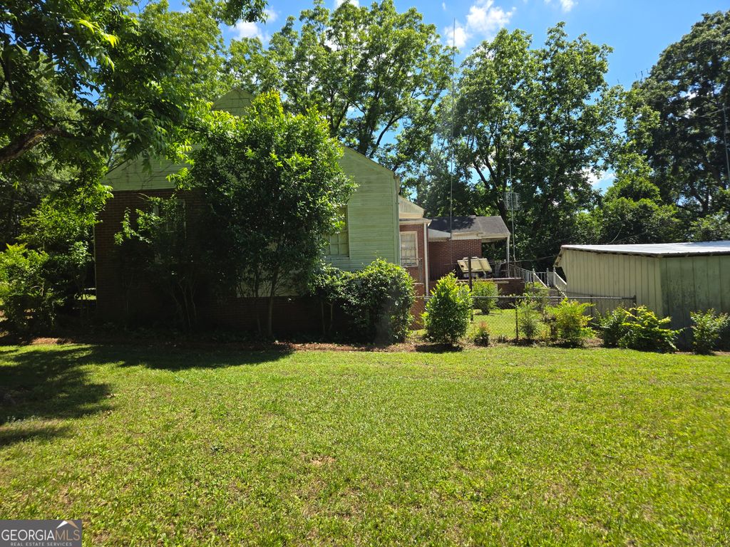 Photo of 909 Thomaston Street, Barnesville, GA 30204 (MLS # 10767110)