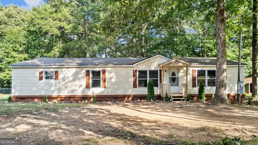 Back on the market, not fault of seller, buyers had family emergency!  Recently updated! This 3 bedroom 2 bath home offers and inviting open floor plan with a cozy fireplace and plenty of natural light! The kitchen features abundant cabinet space, while the spacious master suite boast a large bath for relaxing at the end of the day. Step out onto the large  back deck and enjoy beautiful views of Wax Lake.  No lake access. Seller still working on yard clean up, closet and floor repairs and replacing a window.