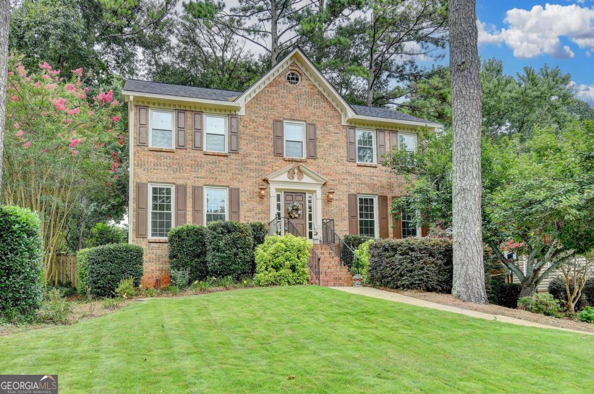 Welcome to this beautifully maintained 4-bedroom, 2.5-bathroom home located in THE highly sought after neighborhood of Flowers Crossing with award winning schools in the Brookwood School District! This spacious home features a large, light-filled living room perfect for relaxing, dining room perfect for entertaining, while the fabulouS' deck offers an ideal space for outdoor gatherings. This home has a spacious kitchen with plenty of storage. The large bedrooms and updated bathrooms add modern comfort. The finished flex room in the basement provides the perfect spot for a playroom, home office, or man cave! Ideally situated close to top-rated schools, shopping, and restaurants, this move in-ready home offers both convenience and charm. Don't miss out!