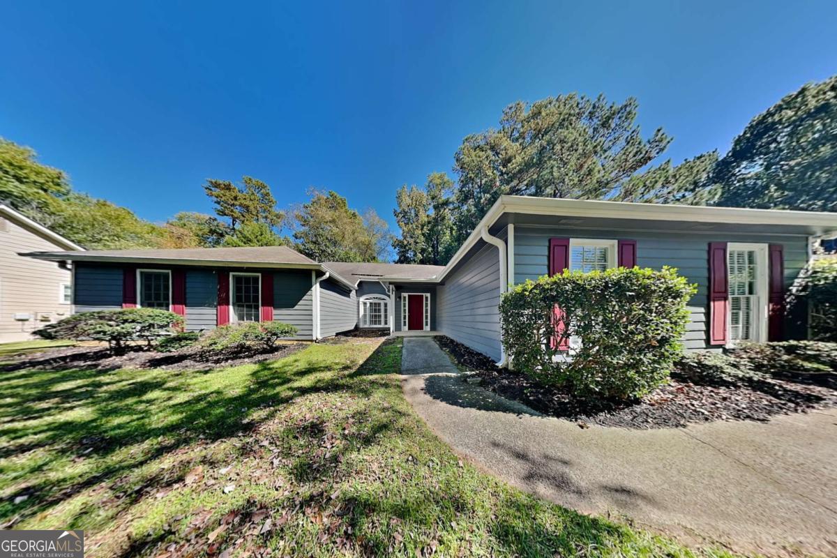 Welcome to 2065 Arbor Forest Dr SW, a charming 3-bedroom, 2-bathroom ranch-style home in desirable Marietta, GA. This inviting property offers the perfect blend of comfort and style. Key Features: - Bright and airy interior with ample natural light throughout - Gourmet kitchen featuring sleek granite countertops and stainless steel appliances - Cozy living room centered around a warm fireplace - perfect for relaxing evenings - Luxurious master suite with indulgent soaking tub - Versatile outdoor living spaces including both a porch and patio in the backyard - Extended driveway provides plenty of parking This single-level home's open floor plan and generous windows create a spacious, light-filled atmosphere. The updated kitchen is a chef's dream with its granite surfaces and high-end appliances. Gather with family and friends around the living room fireplace or enjoy outdoor entertaining on the porch and patio. The tranquil master suite offers a spa-like retreat with its soaking tub. Two additional bedrooms provide flexible space for family, guests, or a home office. The extended driveway adds convenience and curb appeal. Located in a quiet neighborhood yet close to Marietta's amenities, this move-in ready home offers the ideal combination of comfort, style and location. Don't miss this opportunity - schedule your showing today!