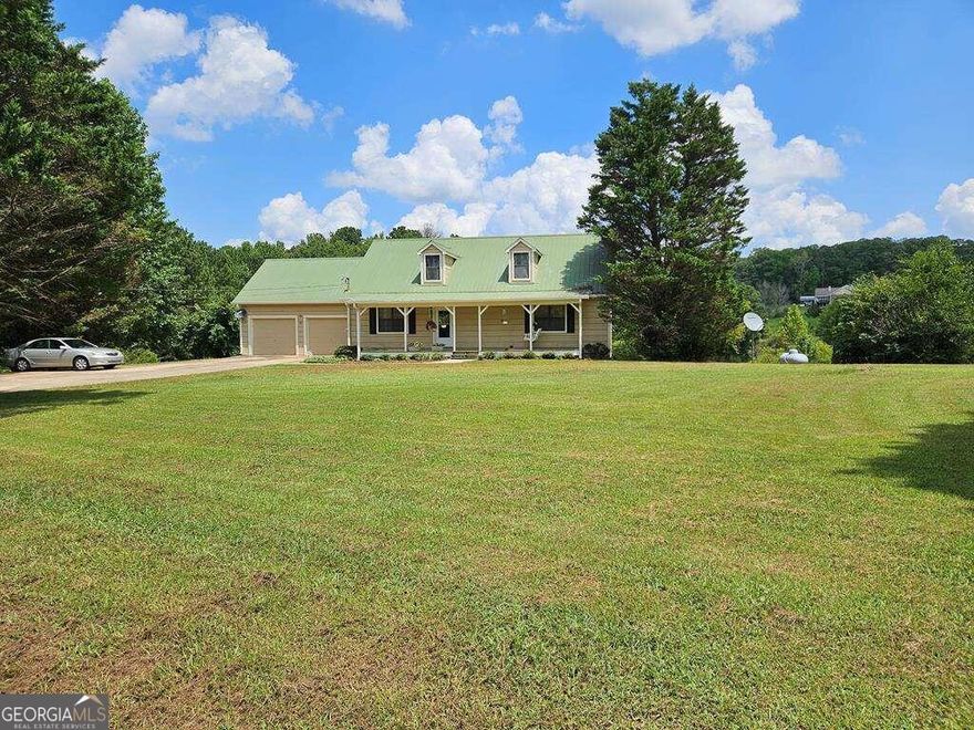 Wonderful Ranch Home on a Full Unfinished Basement, on 10 Acres With a Lake. Open Floor Plan 2BR/2BA, Beautiful View of The Lake and Land From The Back Deck. An adjoining 5 Acres are available for an additional $65,000.