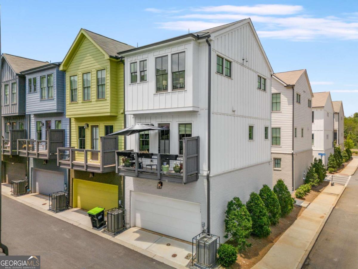 As soon as you step into this townhome you'll know you'll live your best life here. This stunning 2-bedroom, 2.5-bathroom townhome is an end unit drenched in natural light, and high ceilings that make every room feel spacious and airy. The kitchen is a chefCOs dream, featuring all-new Caf appliances and elegant finishes. Every inch of this home has been meticulously maintained, including beautiful design touches that will make you fall in love at first sight. Nestled near Grant Park, this townhome offers your own private spur trail to the Atlanta BeltlineCoideal for morning jogs or evening strolls. Plus, youCOre steps away from vibrant city life with bike lanes and sidewalks leading you straight to the best spots in town. And donCOt worry about parkingCoyour 2-car garage has you covered.