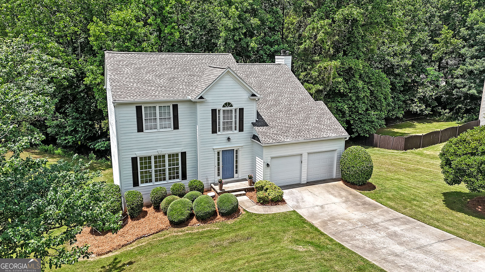 Fresh and modern take on the classic colonial! Great curb appeal with its whitewashed look and sky-blue painted door. Large half acre plus corner lot! The interior is equally light and bright with all new soft white paint, brand new light oak colored floors throughout the first floor, and brand new carpet upstairs. Tons of natural light highlight all the pretty updates! To the left off the two-story foyer is the living room which would also make a great study for those who work from home. Adjacent is the dining room with great views to the backyard. The heart of the home is the appealing white kitchen with center island, walk-in pantry, retro style tile, breakfast area, and another large window looking out over the green of the backyard. The kitchen opens to the spacious great room with its wall of windows and handsome fireplace. Upstairs is the luxurious master suite with stunning, updated master bathroom with dual sinks, and extra-large closet. Also upstairs are three additional secondary bedrooms, updated secondary bathroom with dual sinks, and convenient second floor laundry room with washer/dryer. A full unfinished basement completes the house, ready for your changes or available for lots of storage! Brand new roof and brand new garage doors completes the package!