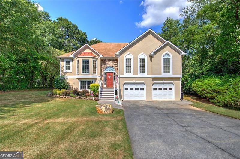 Welcome home! This very well maintained home features 4 bedrooms and 3 bathrooms. Low maintenance luxury vinyl flooring, separate dining room, eat-in kitchen overlooking private backyard, master suite with sitting area. Downstairs boasts a den, large bedroom with walk-in closet and full bath. Oversized garage will easily house a full size truck. This home is a must see!