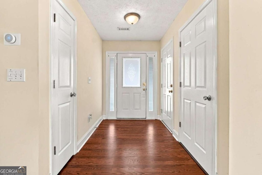 Photo of 3338 Woodtree Lane, Buford, GA 30519 (MLS # 10849246)