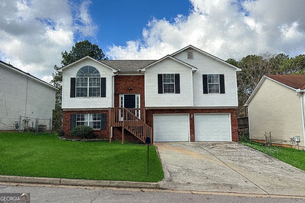 Photo of 5813 WELLBORN OAKS Ct, Lithonia, GA 30058 (MLS # 10650648)