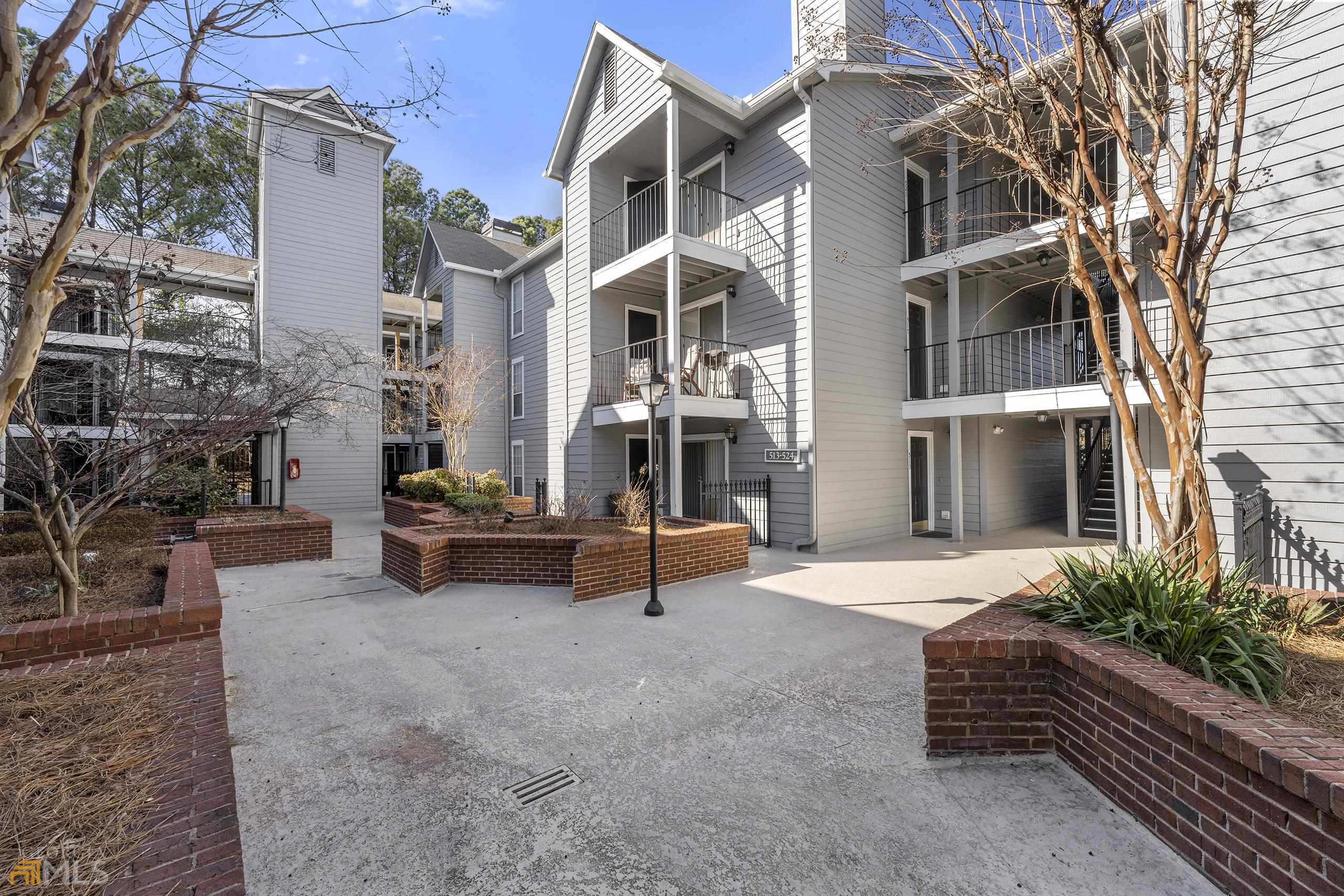 FULLY FURNISHED, Move-In Ready One Bedroom Sandy Springs Condo. Open Floor Plan. Living room has Built in Shelves and Cozy Fireplace. The Kitchen has Stainless Steel Appliances and Is Open to The Living Room with A Breakfast Bar and A Separate Dining Area. Large Bedroom with Walk in Closet. Laundry Room In the Kitchen. Large Private Patio in The Back Overlooking Wooded Area with Storage Closet in Patio. Stepless Entry with Elevator Access from The Parking. Covered Deeded Gated Parking. Excellent Property for Investors. No Rental Restriction, NO AIRBNB Or Short-Term Leases, Not FHA Approved. HOA Includes Gas, Water, Sewer, Pest Control, Valet Trash Pickup. The Community Has a Pool and Gym Facility. Perfect Location Convenient To 400 And 285. Minutes To Costco, Perimeter Mall, and Restaurants. Condo is on first floor.