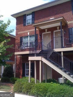 Available July 1, 2025. This well-appointed 2-bedroom, 2.5-bath condo offers comfort, convenience, and style in a prime location near Normaltown, Loop 10, and the UGA campus. Each bedroom features its own private en-suite bath, while a convenient half-bath is located on the main level. The home boasts hardwood flooring in the living room, tile in the kitchen, and real wood cabinetry. The upscale appliance package includes a smooth-top stove, built-in microwave, refrigerator, dishwasher, washer, and dryer. Located on the bus line for easy commuting, this pet-friendly property (with approval and applicable pet fee) combines accessibility with modern amenities. Please note that all utilities are the responsibility of the tenant. A non-refundable application fee applies. Security deposit equal to one month's rent and the first month's rent are due upon lease signing. Showings are limited due to the current tenancy. Please be aware that listing photos reflect furnishings from a previous occupant and may not represent the current tenant's belongings