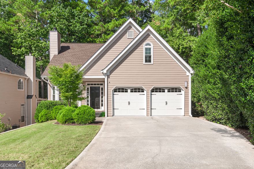 Location, Location, Location! Don't miss this beautifully renovated home nestled in the desirable River Song community - just minutes from vibrant Downtown Roswell!  Tucked away on a quiet cul-de-sac, this charming home features a private, fenced backyard, perfect for kids, pets, or garden enthusiasts. Inside, you'll find fresh paint and new carpet throughout, along with gorgeous true hardwood floors on the main level - a rare find!  The updated kitchen and all renovated bathrooms bring modern comfort and style. The main-level primary suite offers convenience and privacy, while the two-story fireside great room, open to the dining area and kitchen, creates an ideal space for entertaining or cozy nights in.  Upstairs, enjoy a versatile loft/office overlooking the great room, plus two spacious secondary bedrooms, a shared updated bath, a bonus room, and a laundry room.  Step outside to your private deck, perfect for relaxing or hosting guests, all with a serene view of the fenced backyard.  Located just minutes from GA-400, top-rated schools, parks, and the shops and dining of Downtown Roswell - this home truly has it all!