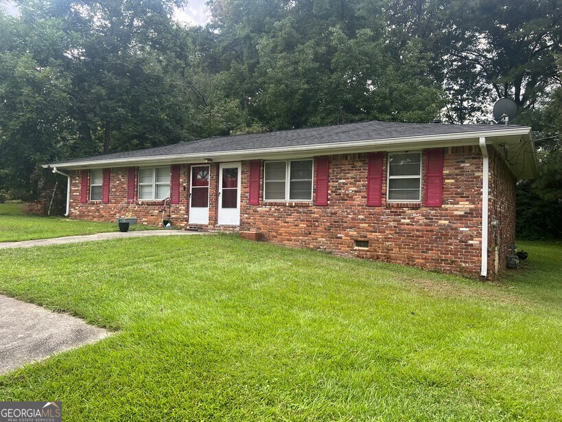 2 Bedroom 1 Bath duplex featuring a large family room, kitchen with breakfast area, 2 oversized bedrooms, bath, washer & dryer connections, 2 dedicated parking spaces & patio.