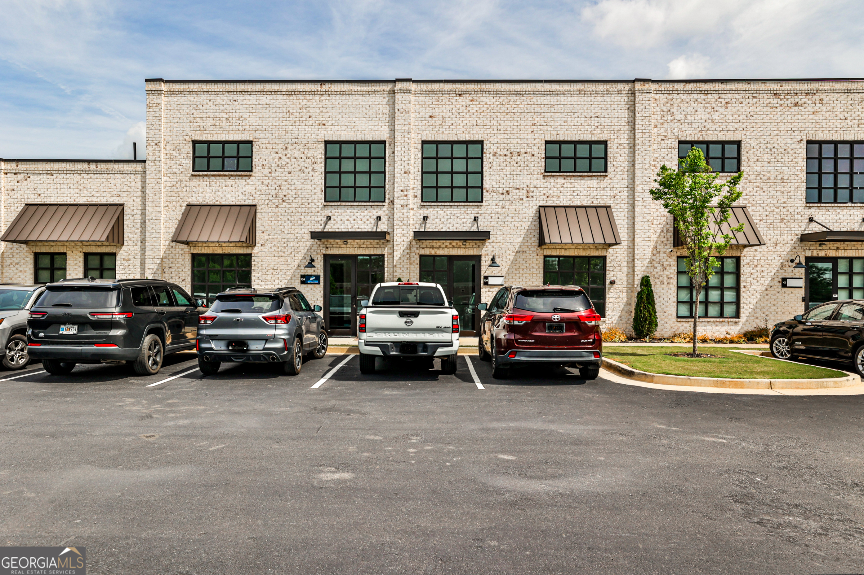 This beautifully renovated 1,800-square-foot office condo offers an ideal layout for productivity and comfort. Soaring high ceilings and abundant natural light create an inspiring work environment, while the modern interior is completely brand new-ready for immediate occupancy. Located just off Hwy 9 in South Forsyth County, this space provides excellent access for clients and employees alike. The flexible floor plan is perfect for professional offices, creative studios, or growing businesses looking for a polished and functional space. Don't miss this opportunity to own a light-filled, turnkey office in one of Forsyth's fastest-growing corridors.