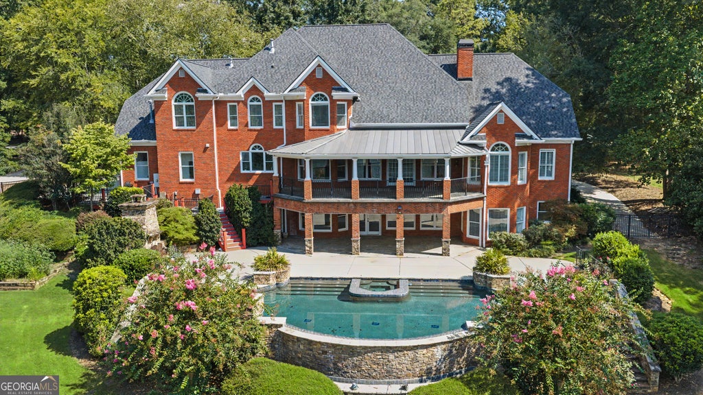 Photo of 135 Pebble Beach Drive, Fayetteville, GA 30215 (MLS # 10838646)