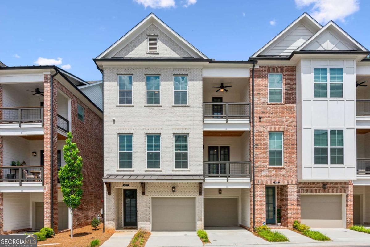 Executive Townhome for Lease. Interior has been totally decorated by a New York Designer and is being offered completely furnished. Experience this luxurious sanctuary in the heart of Alpharetta-truly one of America's most desirable places to live! Located just a minute away from the City Center, this show-stopping townhouse awaits its new owner! As the Providence Group's original model home for the Maxwell community, including perfectly curated interior finishings by the Owner, this 4 bedroom/3.5 bathroom home is filled with the deliberately exquisite design choices expected from any discerning Buyer. Serving as a pied-a-terre for the original owner, you will have the opportunity to be the first full time resident of this amazing end unit! You'll be gratified driving up to this classically designed, white-washed brick facade with 2 covered balconies. As you enter the home from the 2-car garage (with an EV charger), you'll find a 4th bedroom and en-suite bath on the ground level, along with access to the private and covered patio. Ascending the stairs leads you to the breathtaking main level, boasting an open concept living space, dining space, kitchen and sitting room! This is the perfect setting for quiet nights or lavish entertainment! Of course, the centerpiece of the home is the stunningly well-appointed kitchen, replete with top of the line design choices, including quartz countertops and stainless Cafe appliances with Advantium technology, double European convection ovens, a gas range, and more! Further privacy awaits with a covered balcony along the rear of the home as well. The 3rd level offers 3 bedrooms, including a spacious owner's retreat with a jaw-dropping walk-in, oversized spa shower with a built-in bench for additional comfort. When you are ready to experience the offerings of Alpharetta, walk the block to The Maxwell-Alpharetta's open air shopping and dining destination along the southern entrance to the Alpha Loop! Or, spend time in the Maxwell community's amenity areas enjoying the pool, cabanas, bocce ball and more! This amazing home will truly speak to any person who wants to experience life at its fullest!