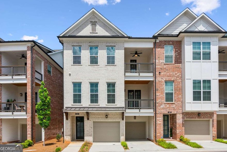 Executive Townhome for Lease. Interior has been totally decorated by a New York Designer and is being offered completely furnished. Experience this luxurious sanctuary in the heart of Alpharetta-truly one of America's most desirable places to live!   Located just a minute away from the City Center, this show-stopping townhouse awaits its new owner! As the Providence Group's original model home for the Maxwell community, including perfectly curated interior finishings by the Owner, this 4 bedroom/3.5 bathroom home is filled with the deliberately exquisite design choices expected from any discerning Buyer. Serving as a pied-a-terre for the original owner, you will have the opportunity to be the first full time resident of this amazing end unit! You'll be gratified driving up to this classically designed, white-washed brick facade with 2 covered balconies. As you enter the home from the 2-car garage (with an EV charger), you'll find a 4th bedroom and en-suite bath on the ground level, along with access to the private and covered patio. Ascending the stairs leads you to the breathtaking main level, boasting an open concept living space, dining space, kitchen and sitting room! This is the perfect setting for quiet nights or lavish entertainment! Of course, the centerpiece of the home is the stunningly well-appointed kitchen, replete with top of the line design choices, including quartz countertops and stainless Cafe appliances with Advantium technology, double European convection ovens, a gas range, and more! Further privacy awaits with a covered balcony along the rear of the home as well. The 3rd level offers 3 bedrooms, including a spacious owner's retreat with a jaw-dropping walk-in, oversized spa shower with a built-in bench for additional comfort. When you are ready to experience the offerings of Alpharetta, walk the block to The Maxwell-Alpharetta's open air shopping and dining destination along the southern entrance to the Alpha Loop! Or, spend time in the Maxwell community's amenity areas enjoying the pool, cabanas, bocce ball and more! This amazing home will truly speak to any person who wants to experience life at its fullest!