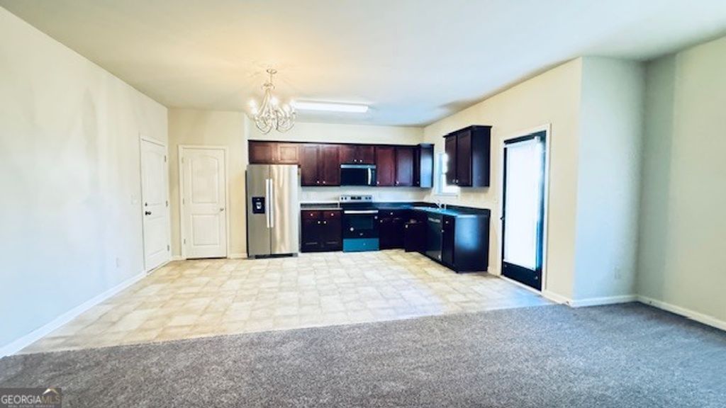 Photo of 606 Grenier Terrace, Lawrenceville, GA 30045 (MLS # 10684657)