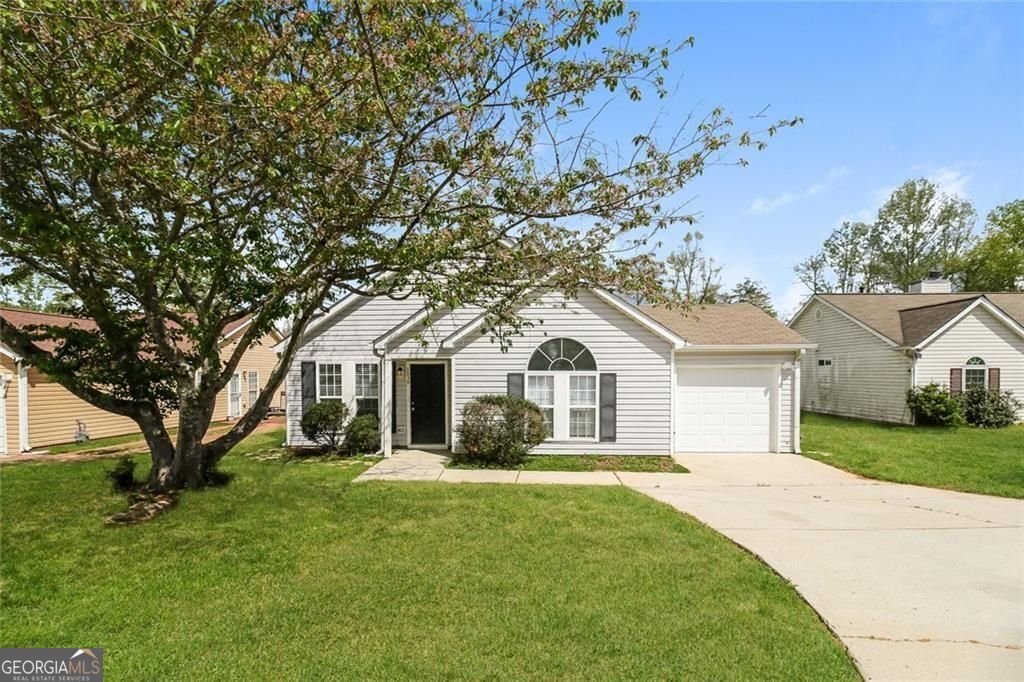 Photo of 5639 Eagles Feather Lane, Riverdale, GA 30274 (MLS # 10732085)