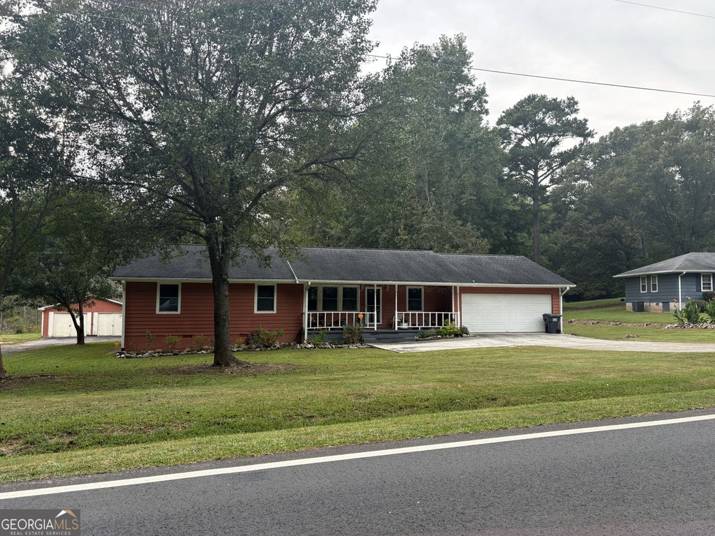Photo of 2063 Ebenezer Road SW, Conyers, GA 30094 (MLS # 10872002)