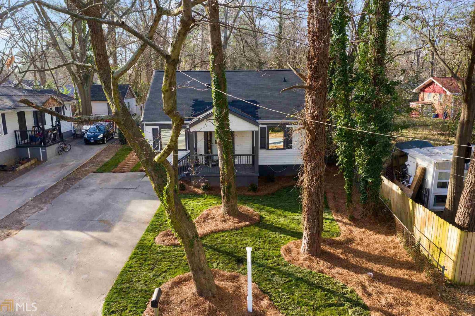 PRICE REDUCED. Sellers Motivation your advantage. Beautifully Renovated Bungalow nestled near East Lake Golf Club. Entertaining is easy with the open clear sight lines front/back in this 4BR/2BA home that has been totally updated. Granite Counters, SS Appliances, New Bamboo Flooring on main with new carpeting in all 4br’s. Tiled Showers, master with double vanity. The back yard is a blank canvas to use your imagination to create your perfect gathering place for friends & family. Endless ideas for the perfect BBQ, Corn Hole, backyard Putting Green, or relaxing sanctuary at the end of the day. *Note, pictures show Virtual Staging to offer decor Ideas only.