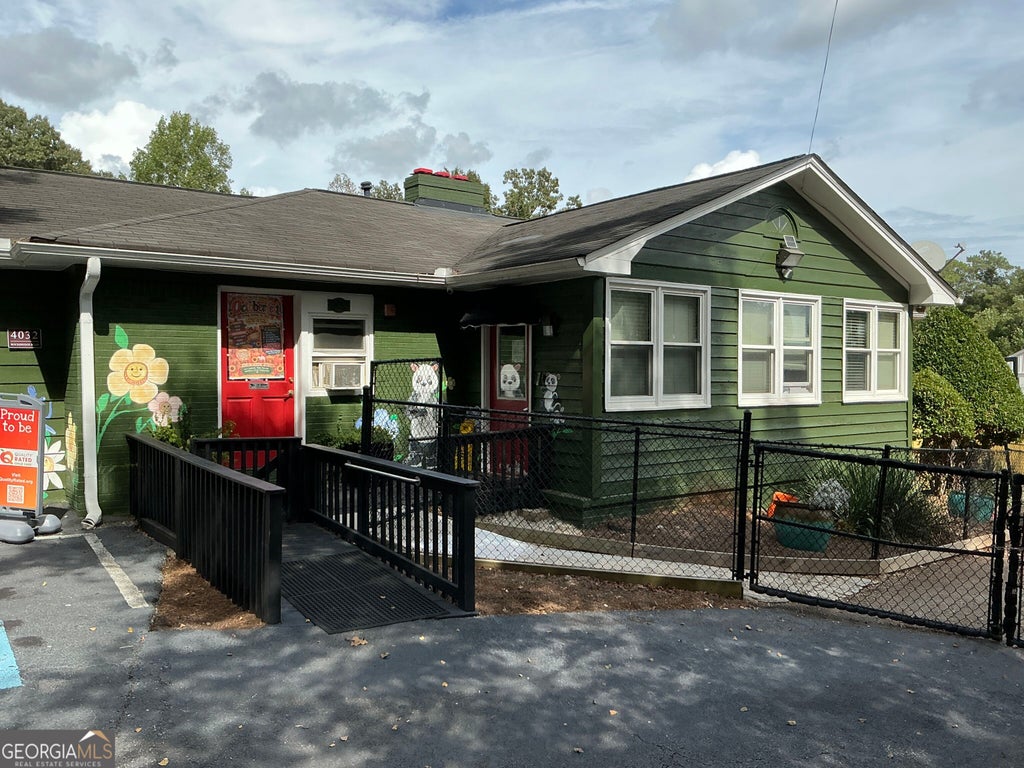 Photo of 4032 Rockbridge Road, Stone Mountain, GA 30083 (MLS # 10867550)